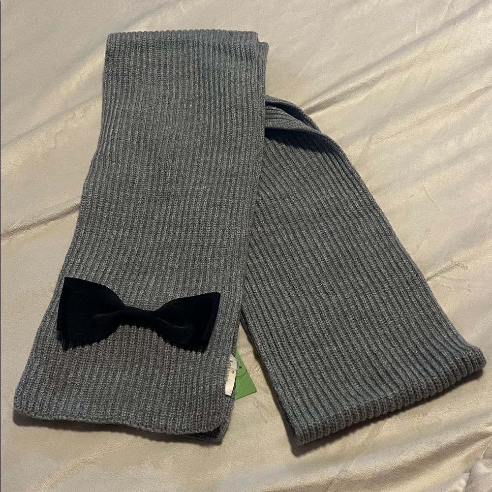 Gray Kate Spade knitted scarf with Black Bow